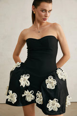 Léonor black floral-appliqué peplum mini dress