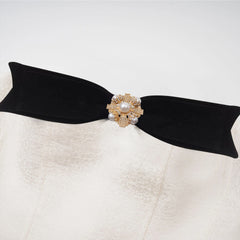 Araminta bow-detail off-shoulder mini dress