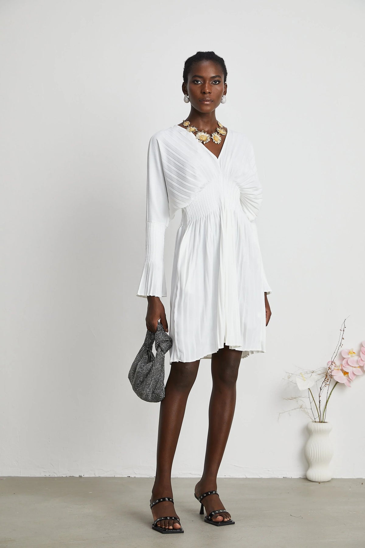 Claudette V-neck pleated mini dress