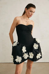 Léonor black floral-appliqué peplum mini dress
