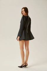 Élise pleated peplum-hem blazer dress in Black
