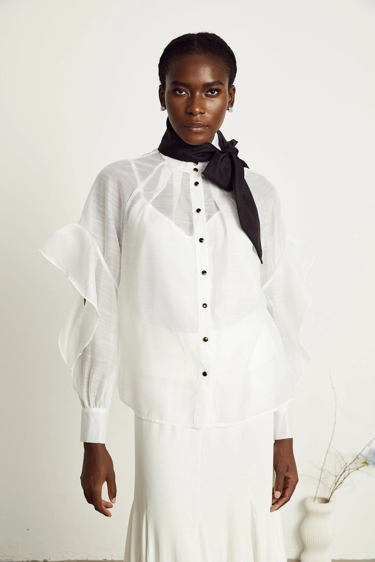 Margaux white semi-sheer ruffled bow-tie shirt