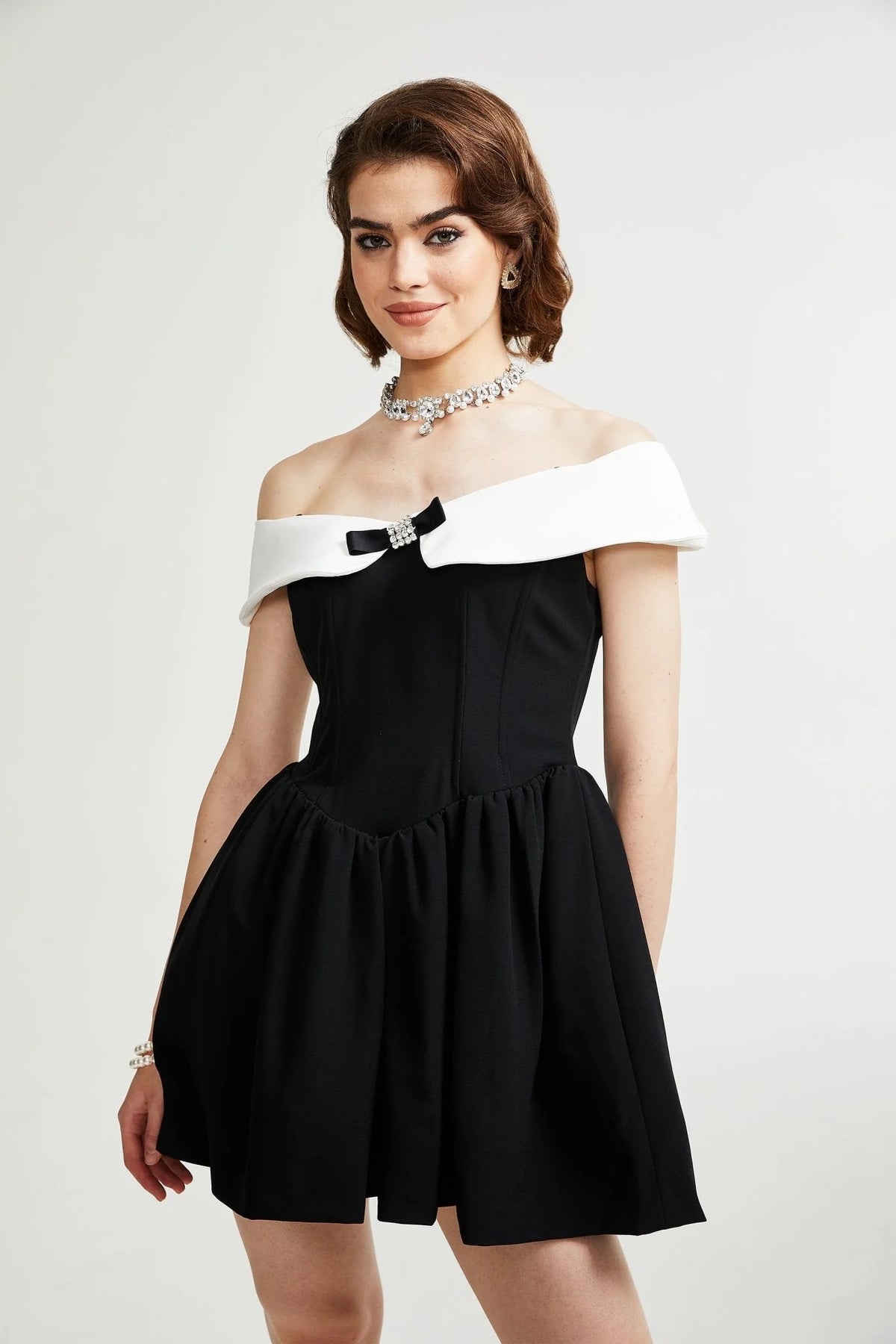 Deniece off-the-shoulder black mini dress