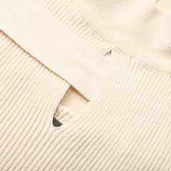 Aladdin-rollneck cut-out knitted top
