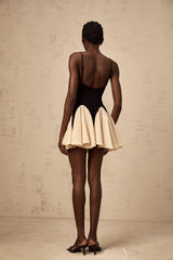 Justine color-blocked godet pleated mini dress