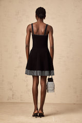 Éliane black studded flared knit mini dress
