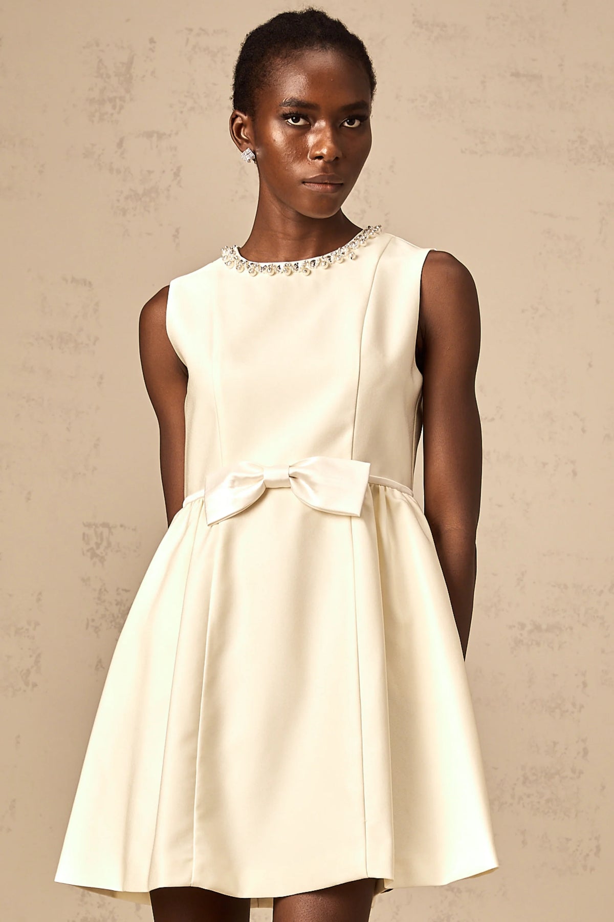 Isabelle white bowknot embellished mini dress