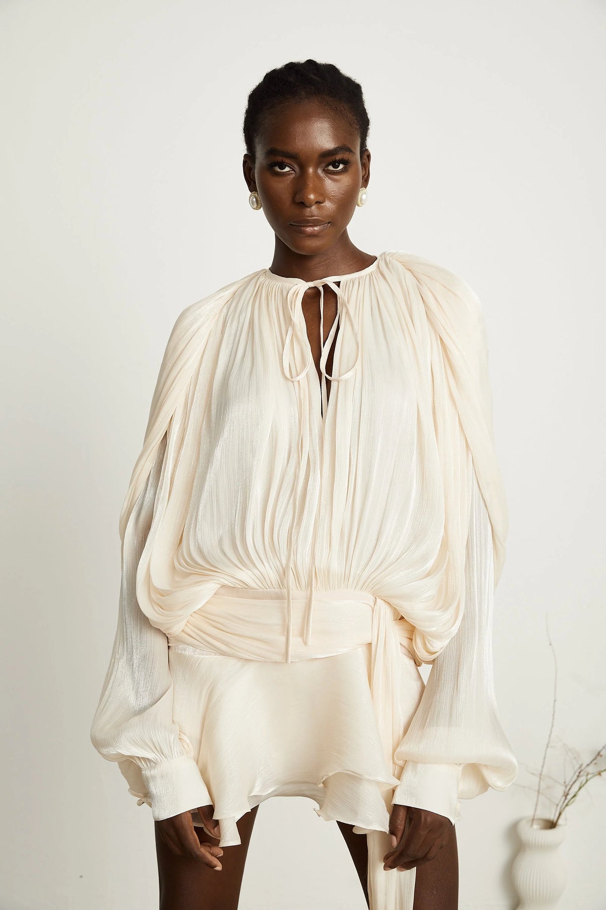 Eugénie fully-pleated ruffled mini dress in Neutrals